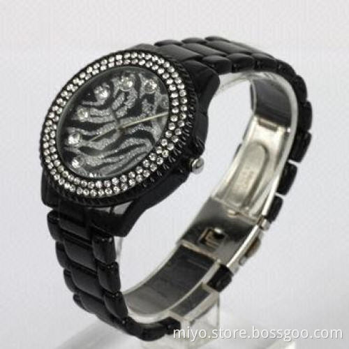 Ladies' fashion watch with stones on case and glitter on dial, fancy, stylish and nice